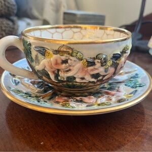 Vtg CAPODIMONTE Italy Hand Painted Relief Cherub Demitasse Cup & Saucer